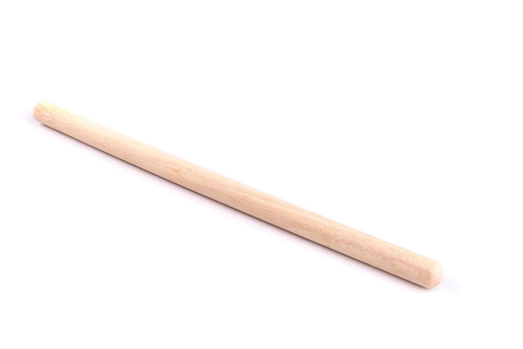 Wooden stick isolated against white background. Favorite kitchen tools.