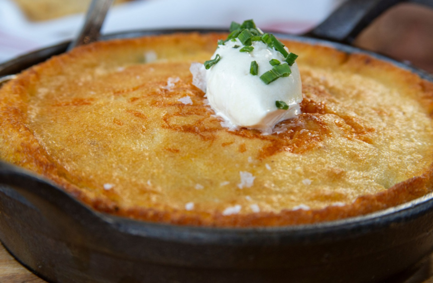 The Skillet Cornbread is a staple on the menu at Yardbird, which recently opened the doors to its new Denver outpost in RiNo. There, you’ll find craveable comfort food classics and Southern charm served with a side of finesse (and a glass of fine bourbon). Restaurateur John Kunkel started the Miami Beach-born brand more than a decade ago with just a few family recipes, and cornbread was one of them. One bite and it’s sure to become a staple on your holiday table, too.