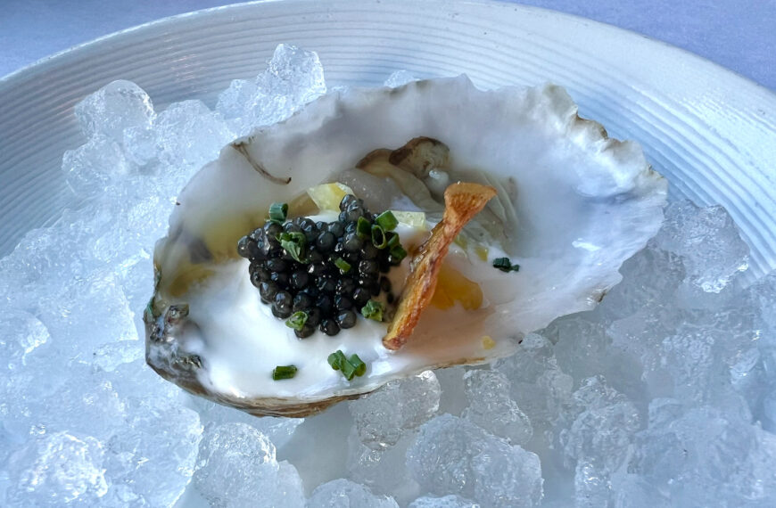 bed of ice with oyster topped with caviar