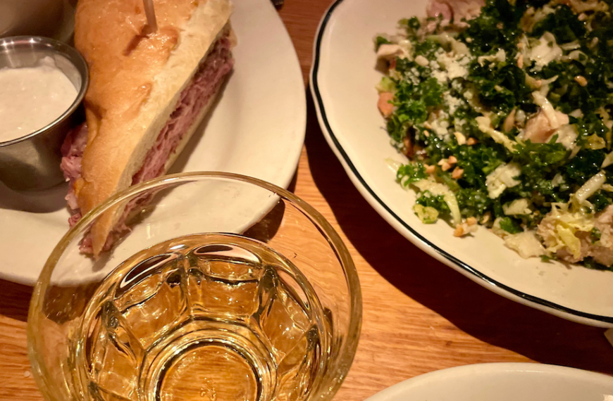 french dip and salad and drink at white house in aspen