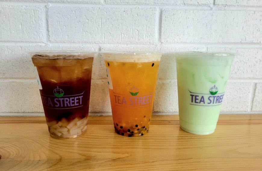 white wall with three different boba teas lined up