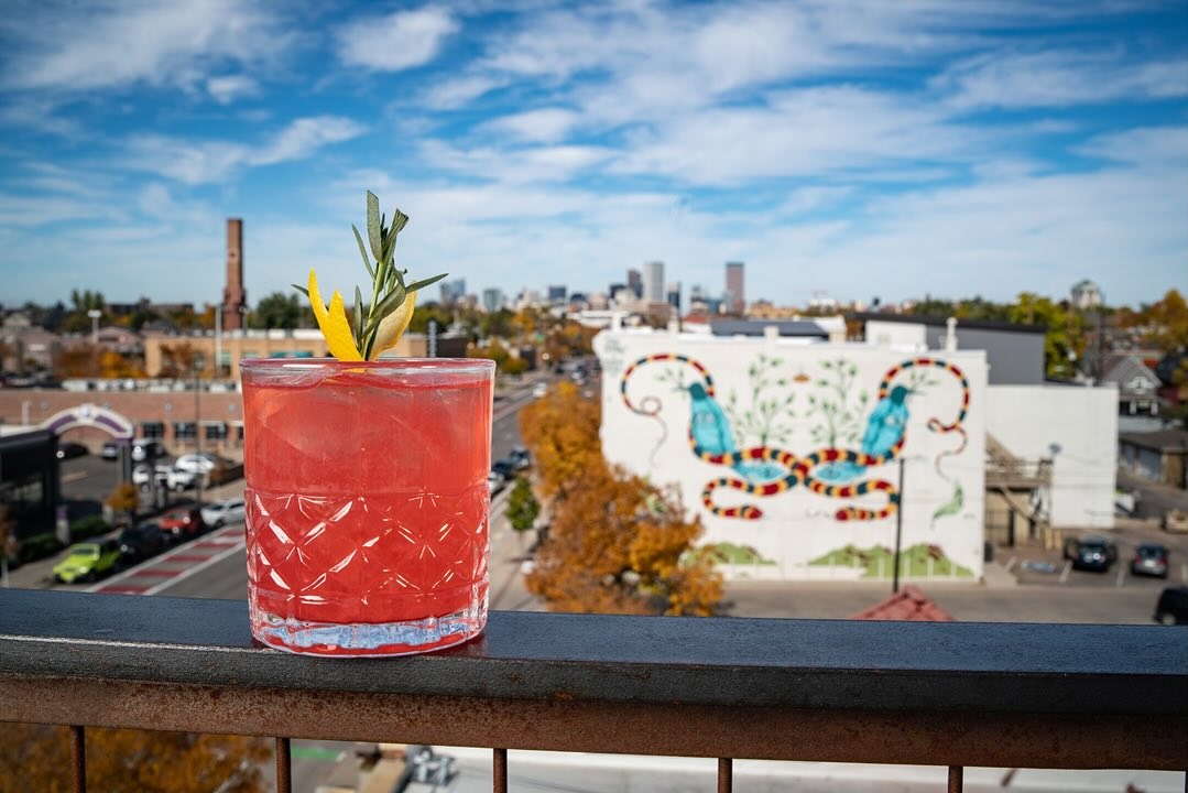 sky with cocktail and mural
