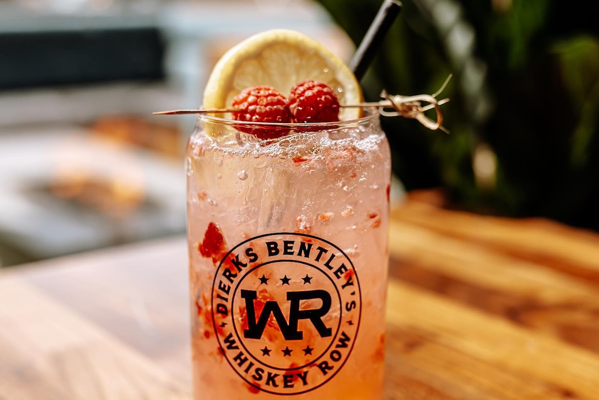 dirks lemonade in glass on wooden table