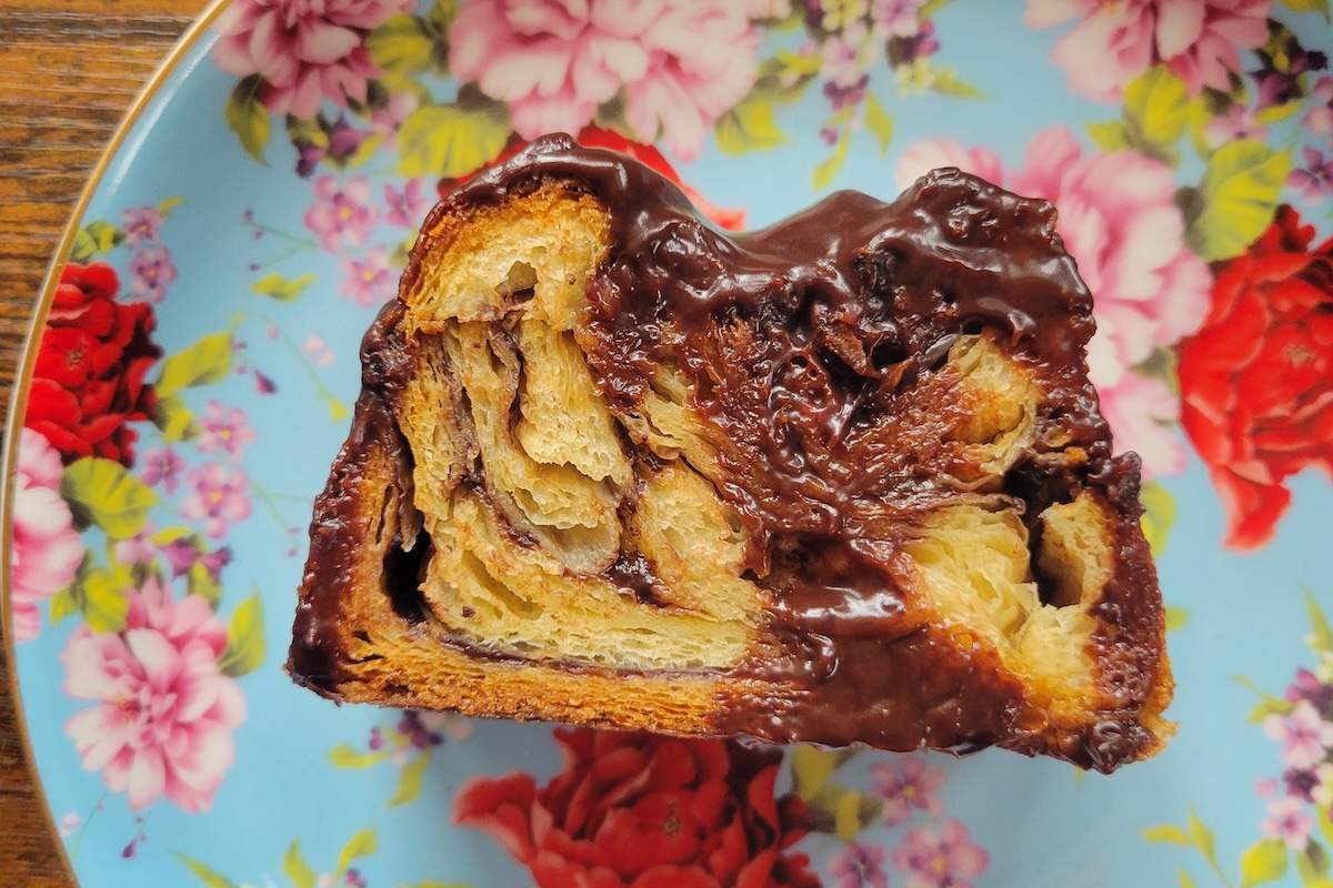 floral plate with baked loaf and chocolate