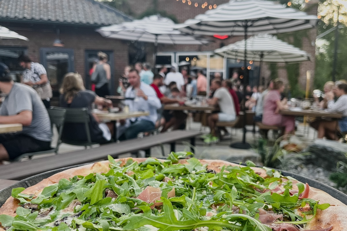 homegrown tap and dough pizza on patio