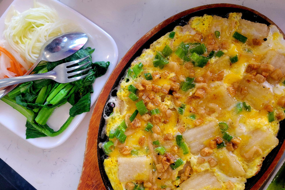 Bột Chiên, or Sizzling Rice Cake Omelet, is a Vietnamese street food dish not often found. | Photo by Linnea Covington now pho