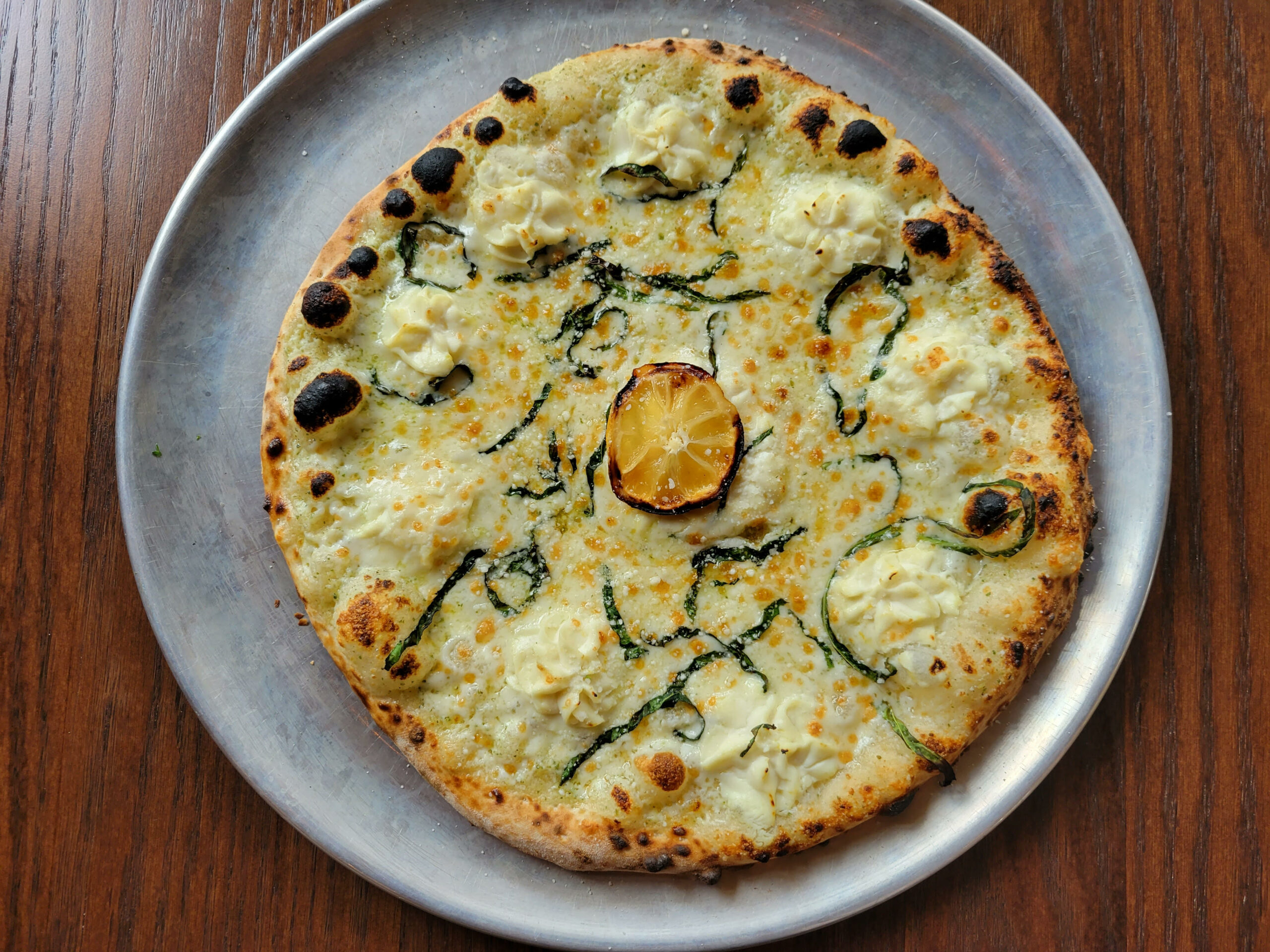 The Lemon Ricotta pizza at Quinto Neighborhood Pizzeria & Taphouse. | Photo by Linnea Covington