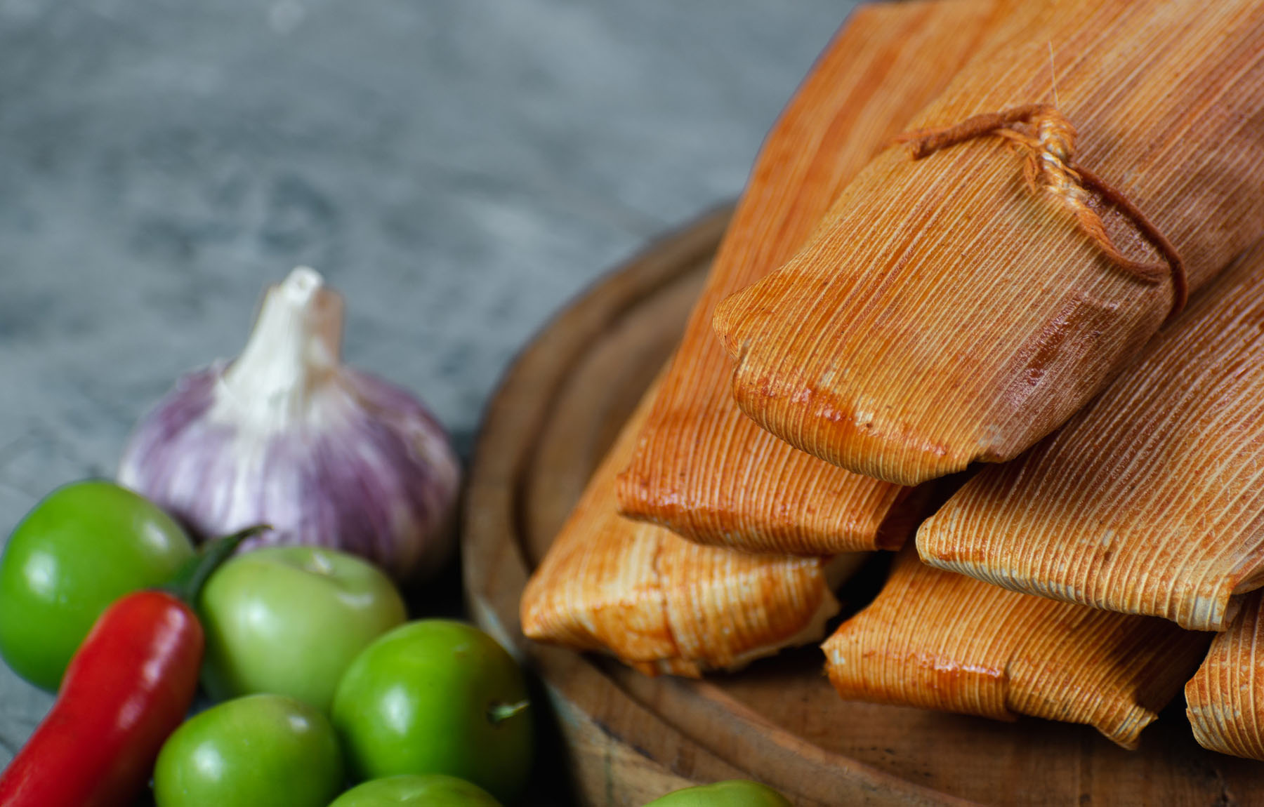 Stack of tamales on a table