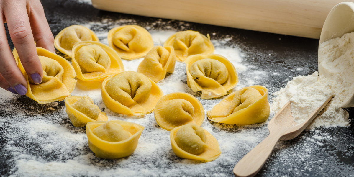 Legend has it that Venus' navel was the inspiration for Feburay 13th celebrated national food day – tortellini. The tale of its origin describes how a tavern owner attempted to spy on the goddess, and after only being able to see her navel through the keyhole, he returned to his kitchen inspired to make a delicious stuffed pasta in the shape of an outie. No matter how silly the story, I’m glad a chef decided that putting meat with cheese into a fun pasta would be a hit among Italians.