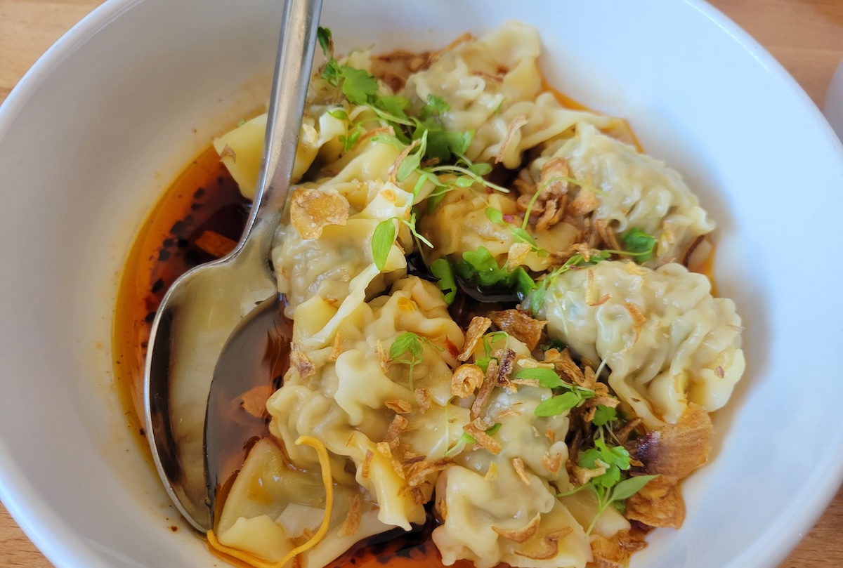 Spicy peanut wontons at Yuan Wonton. | Photo by Linnea Covington