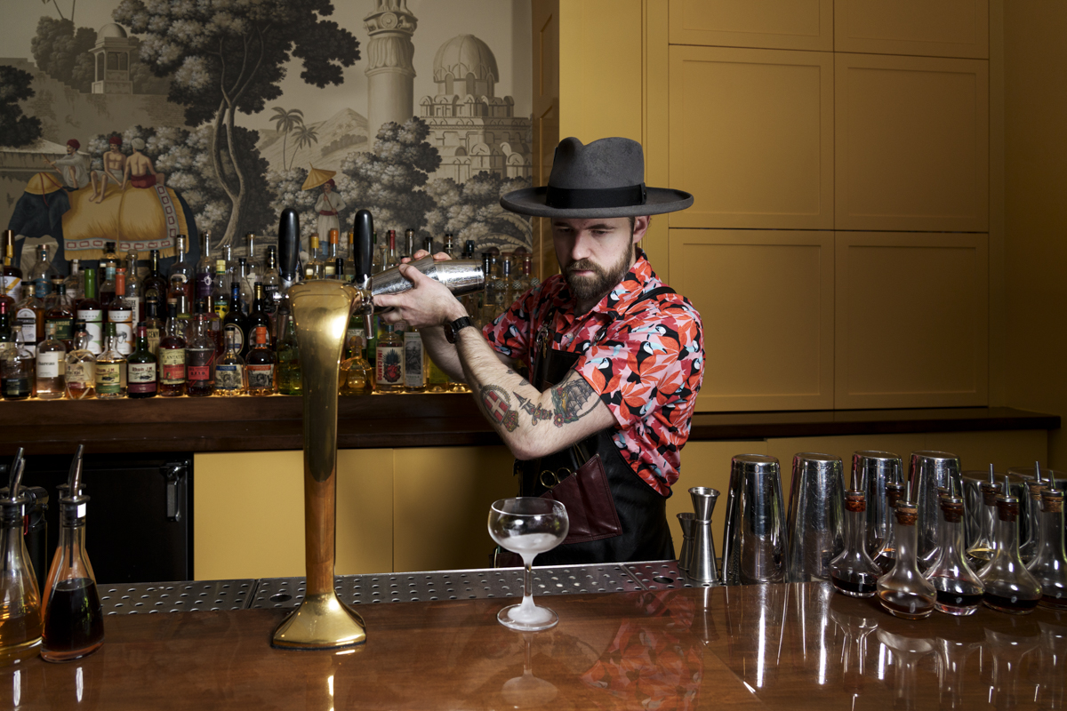 Bar maverick Drew Stevens making drinks. | Photo by Ashley Beguin