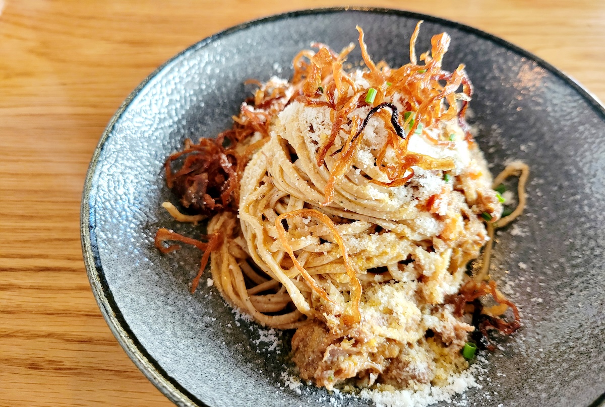 Perennial wheat mafaldine with lamb ragu at Olivia Restaurant. | Photo by Linnea Covington