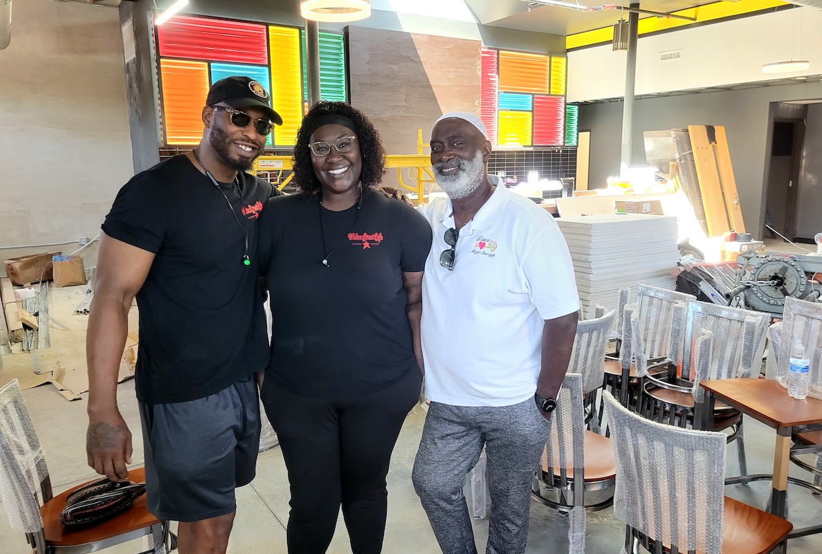 Part of the Dickerson family that owns and operates Welton Street Cafe, Fathom (left), Fathima (center), and their dad, Flynn (right). | Photo by Linnea Covington