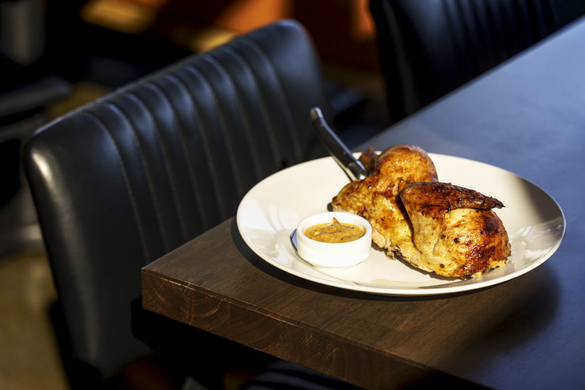 Roast Chicken at Carne. | Photo by Ashley Beguin