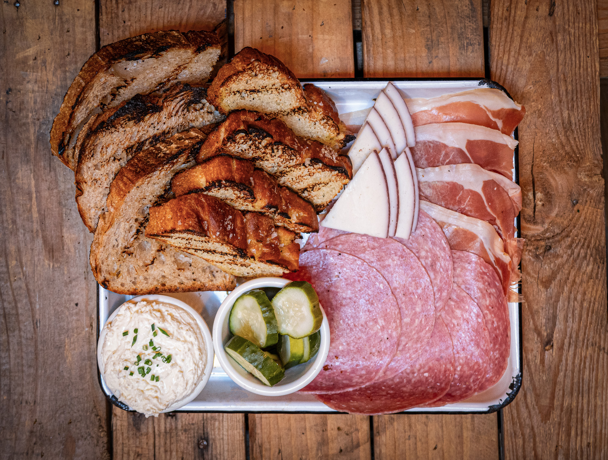 Yes, you can share this charcuterie board with your fur baby. | Photo by Leven Deli Co. 