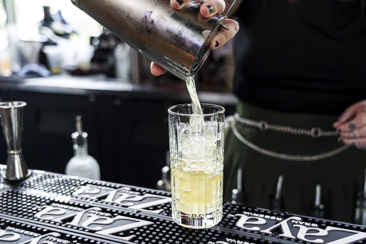 Ariana working the bar at Glo Noodle House. | Photo by Ashely Beguin