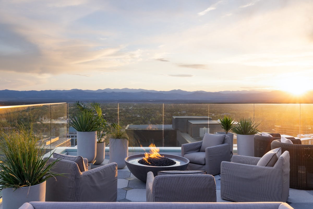 Sit outside at Halo and take in the view with a bite and drink. | Photo by Kimpton Claret Hotel