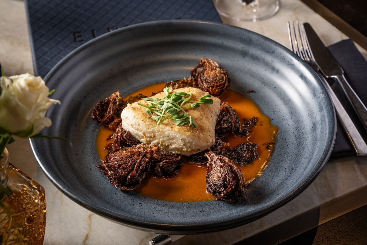 Fennel Braised Halibut with carrot butter sauce at Elway's Downtown. | Photo by The Ritz-Carleton