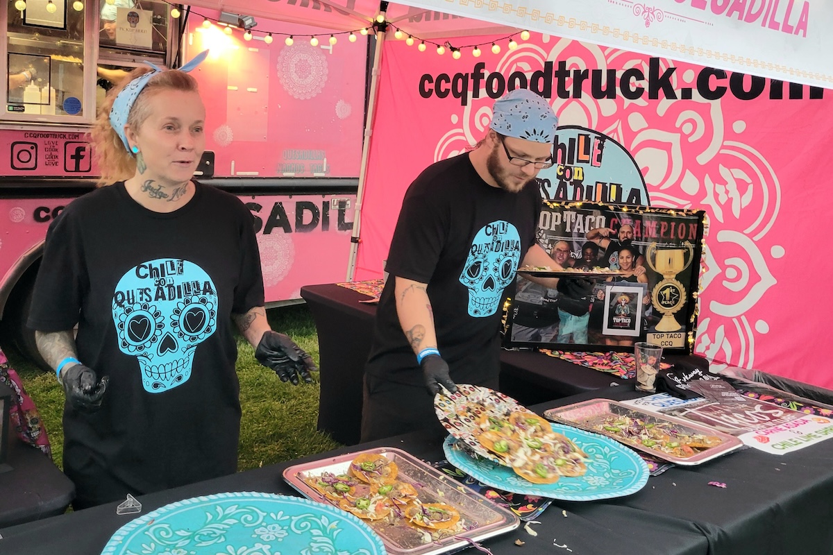 Dishing out tacos from a food truck. | Photo by Linnea Covington