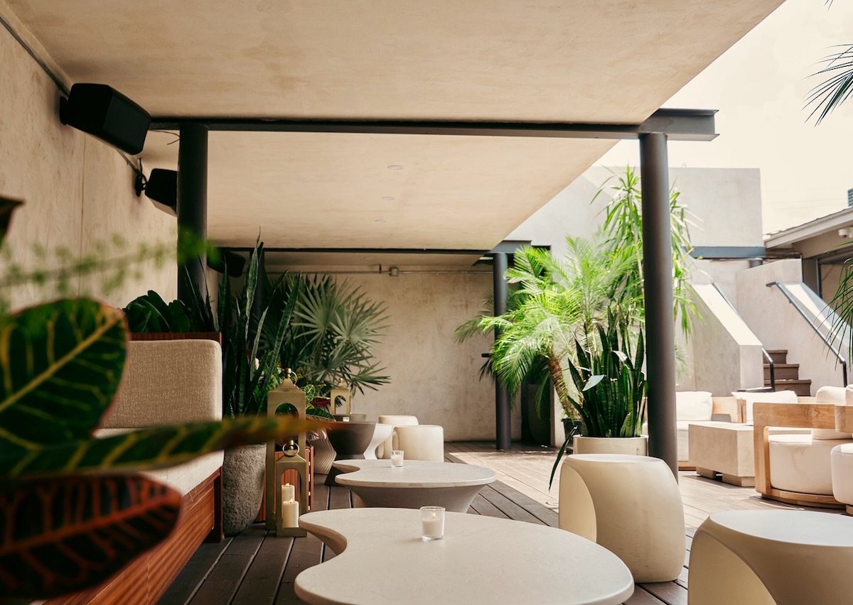 Guests may enjoy covered or uncovered seating on the patio at Melrose. | Photo by Melrose