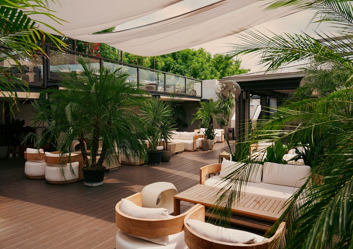 The lush courtyard patio at Melrose. | Photo by Melrose