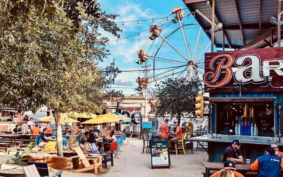 The ferris wheel in the distance at Truck Yard Houston. Photo by Truck Yard