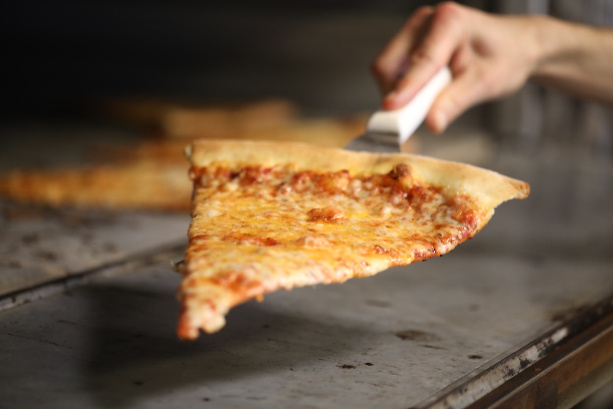 The perfect NYC style slice of cheese pizza. | Photo by Anthony's Pizza and Pasta