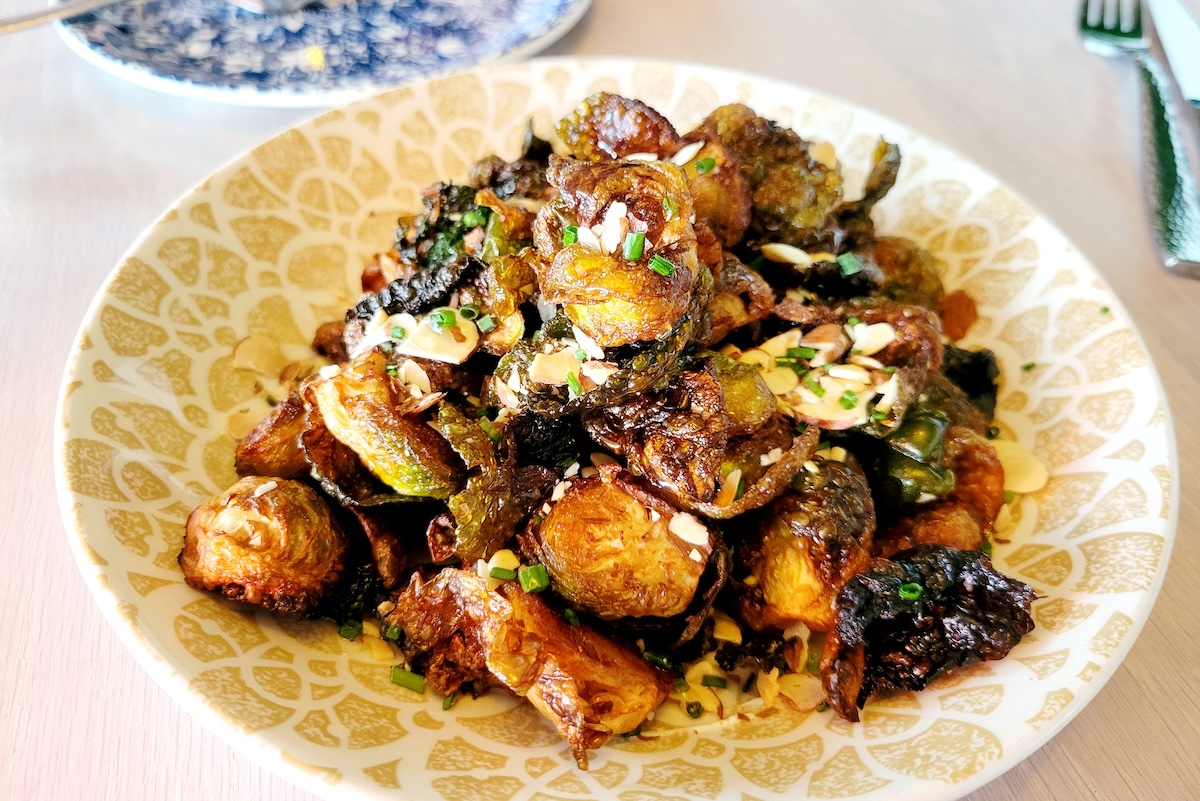 Fried Brussels sprouts won dinner at Hampton Social. | Photo by Linnea Covington