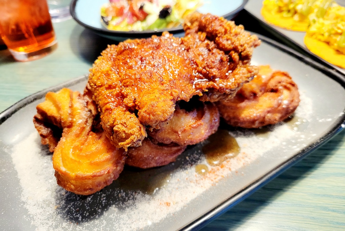 Bask in the glory of hot chicken and churros. | Photo by Linnea Covington