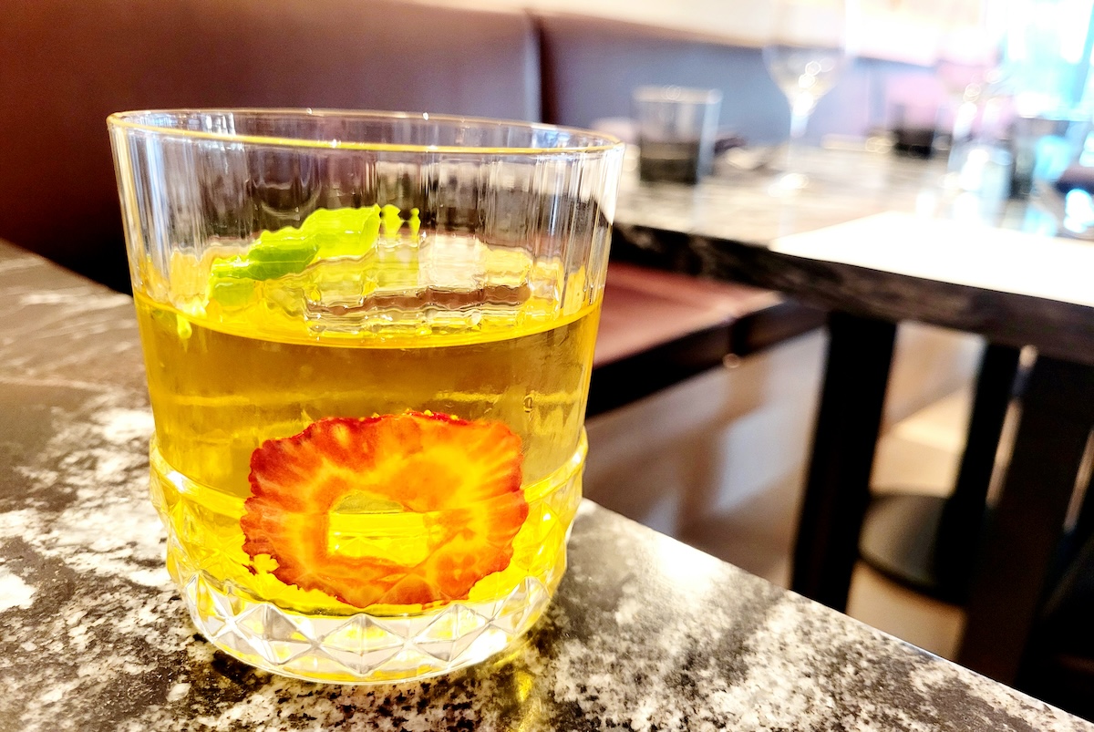 The Negroni Bianco di Roma at Savoring inside the Kimpton Claret Hotel. | Photo by Linnea Covington