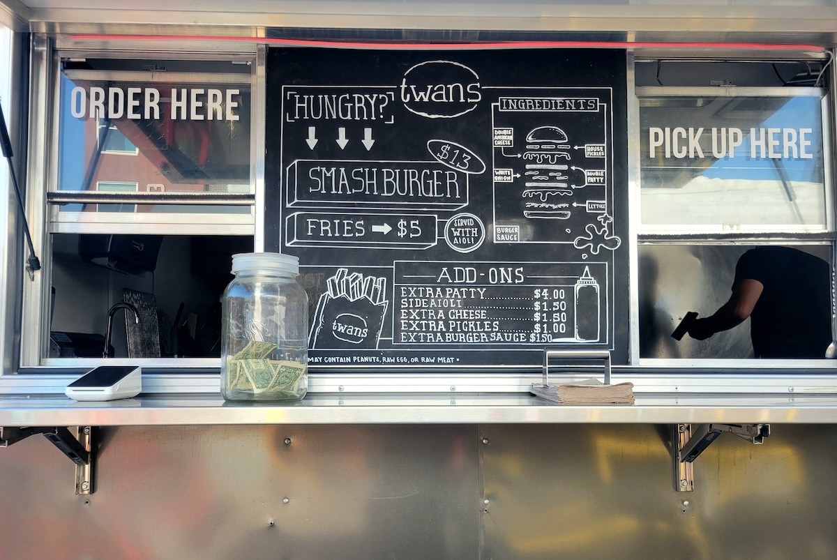 The making of a really good smash burgers at Twan's. | Photo by Linnea Covington