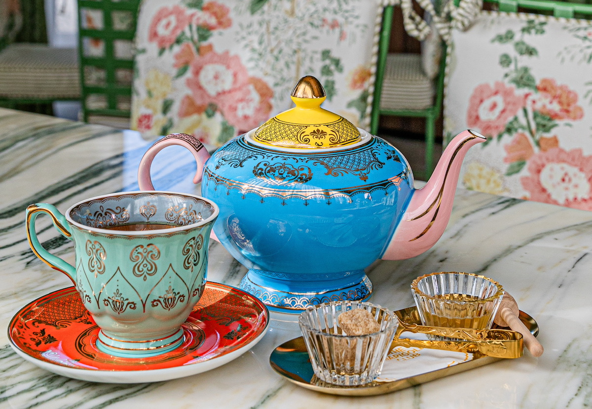 Tea pots and cups in vibrant hues at the Marigold Club. | Photo by Zachary Horst