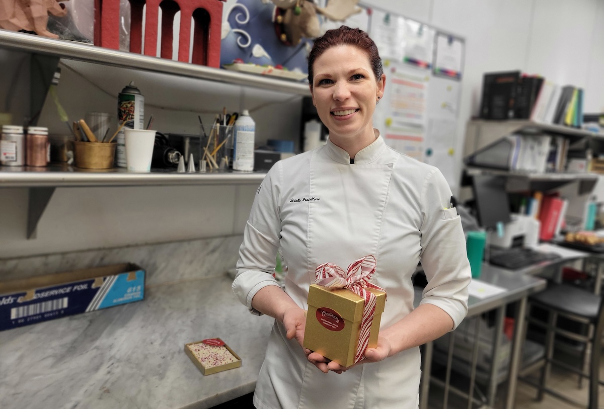 Executive pastry chef Brielle Fratellone oversees the giant gingerbread village. | Photo by Linnea Covington