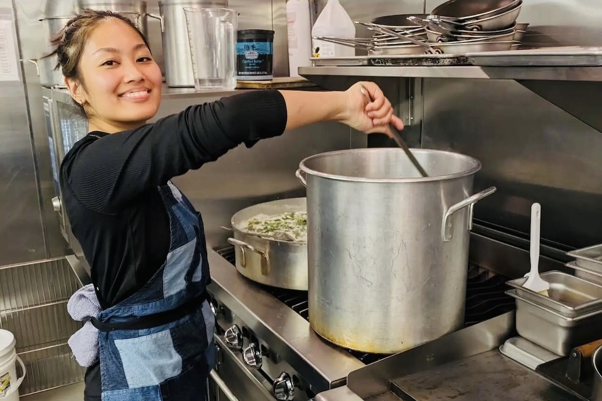 Jodee Reyes, Executive Chef of Magna Kainan, preps for a pop-up at Fox And The Hen. | Photo by Culinary Creative Group