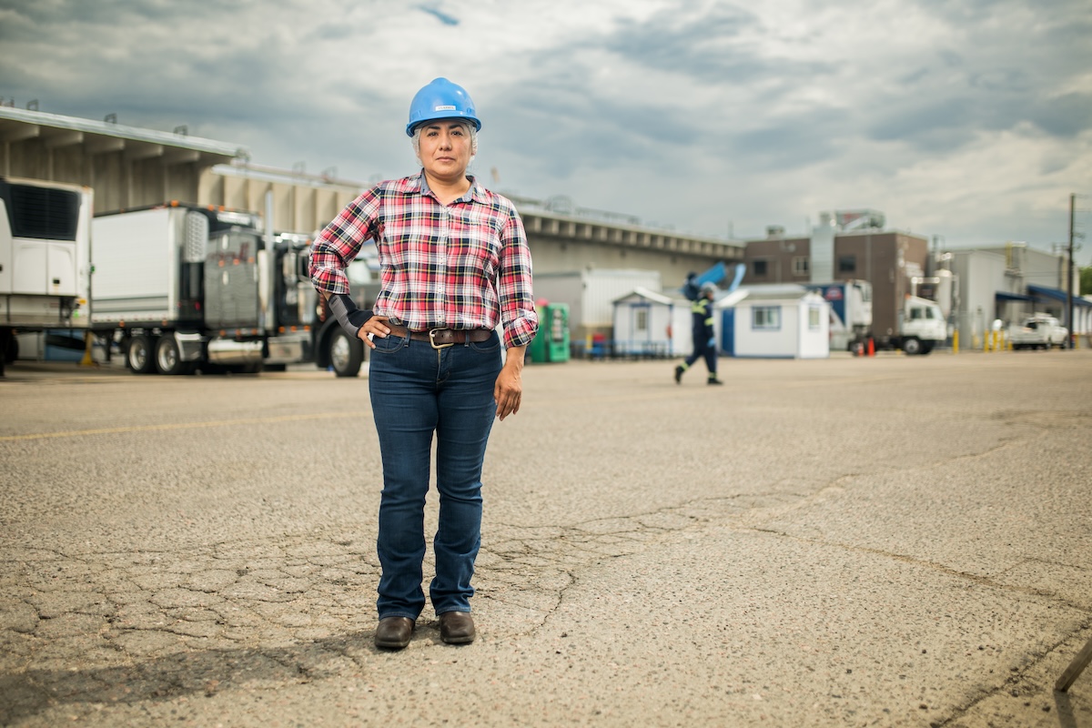 Isabel Bautista, operations manager at Superior Farms stands in the lot outside the facility. | Photo by Parker Rice.