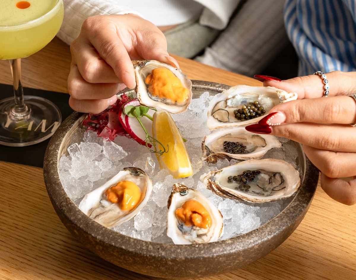 Oysters topped with caviar and uni at Katami. | Photo by Katami