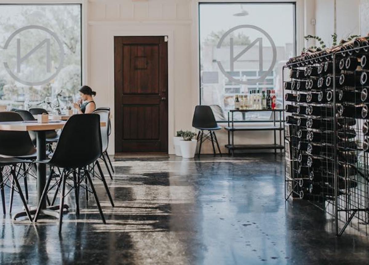 The sleek, spacious interior at Neighborhood Cellar. Photo by Neighborhood Cellar