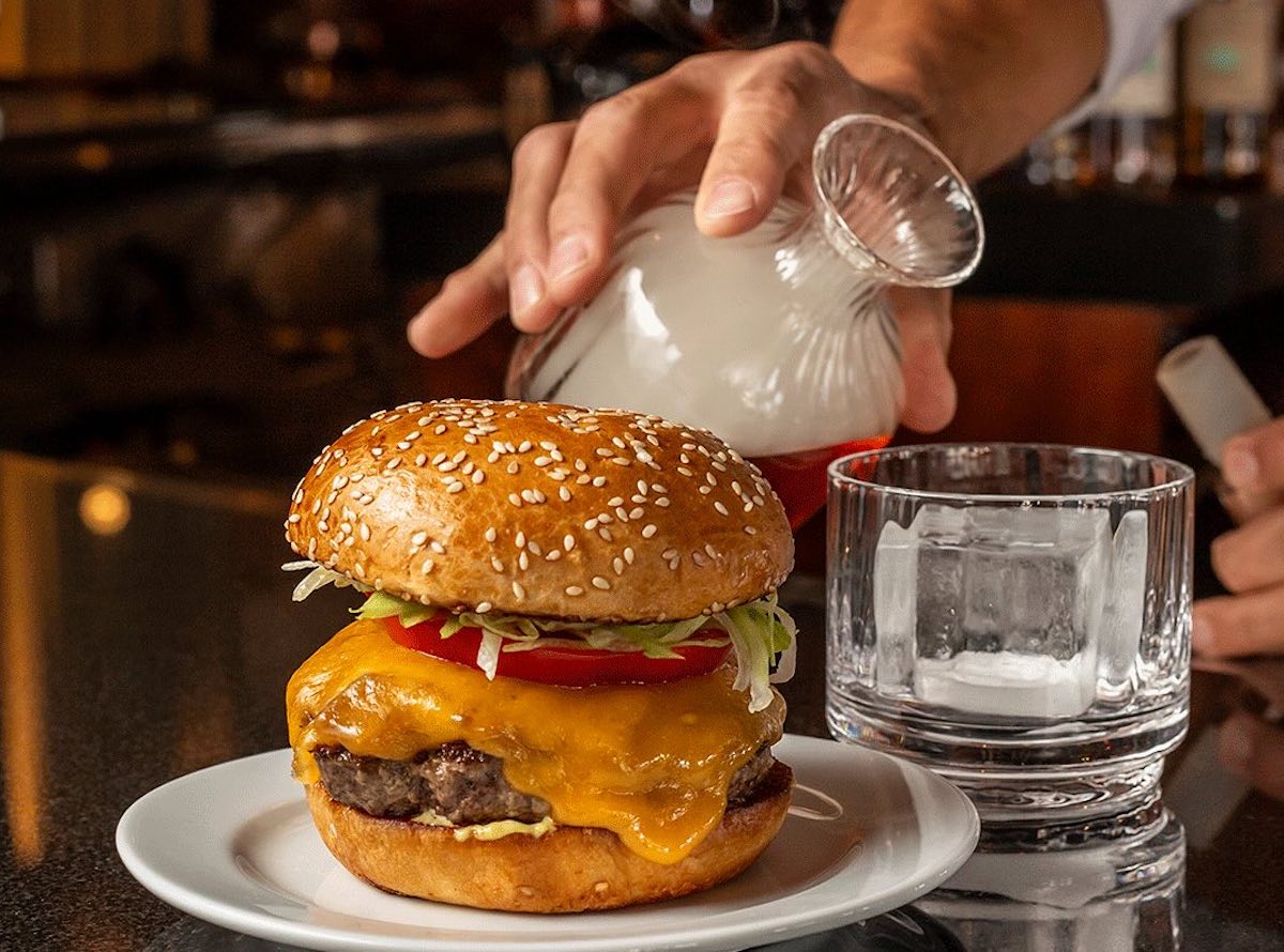 A well-built cheeseburger on a sesame bun at Ocean Prime. | Photo by Ocean Prime