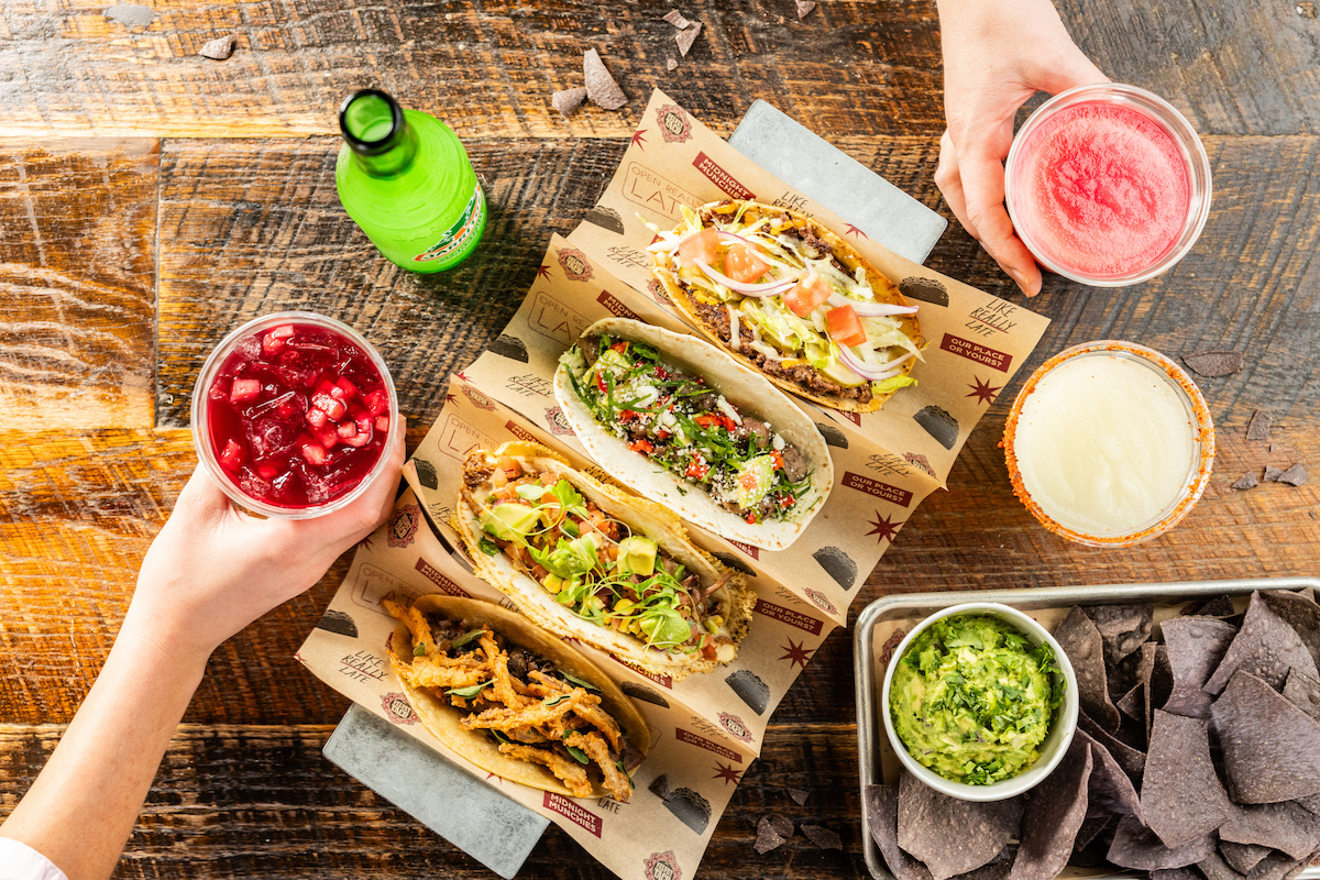 022624_VelvetTaco_KathyTran_IMG_8202 3 - DiningOut A spread of tacos, chips and guacamole, and drinks at Velvet Taco. | Photo by Kathy Tran