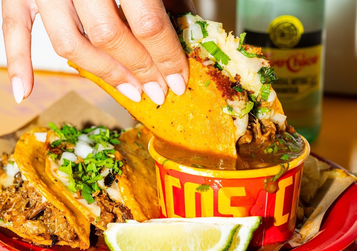 Chilangos 2 copy - DiningOut Birria taco gets a dunk at Cilangos Tacos. | Photo by Chilangos Tacos