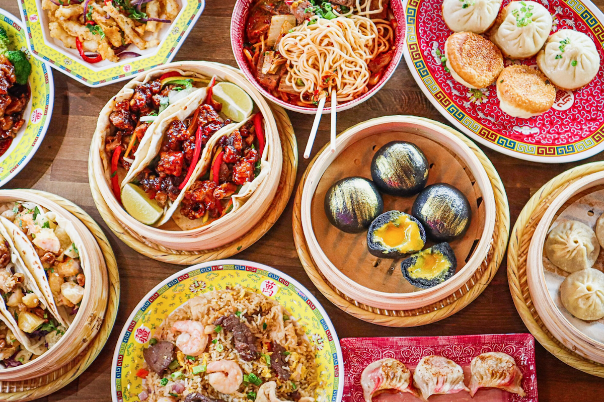 Dragon Casa Photo4_Max Patino - DiningOut A tablescape showcasing Dragon Casa's diverse offerings, including its creative tacos. | Photo by Max Patino