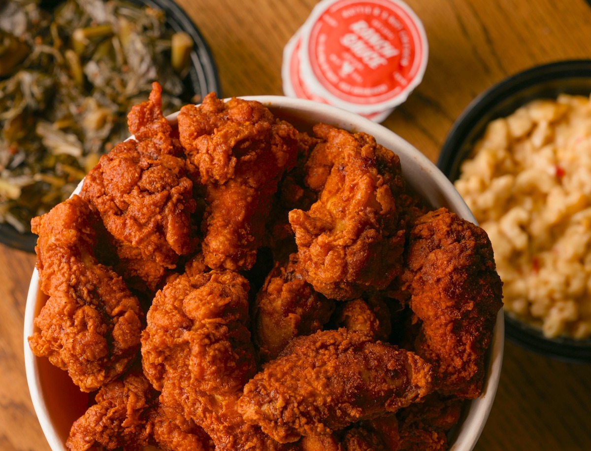 A bucket of hot chicken with sides at Hattie B's. | Photo by Hattie B's