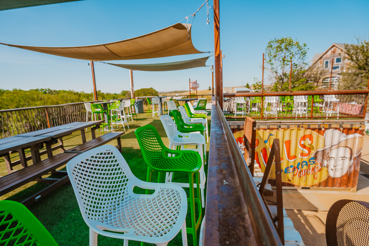 TY Colony_Container Patio-05 - DiningOut Seating overlooking the sprawling grounds at Truck Yard The Colony. | Photo by Truck Yard