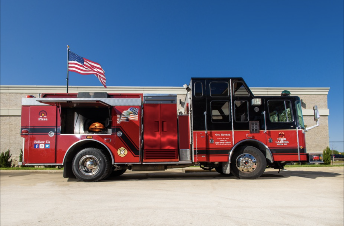 Hook Ladder - DiningOut Hook & Ladder Pizza Co.'s wood-burning pizza oven sits onboard an actual fire truck. | Photo by Hook & Ladder Pizza Co.