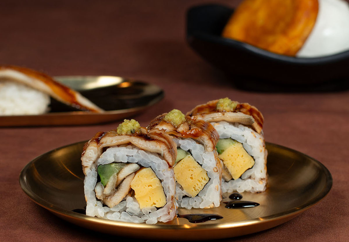 Kura - DiningOut Seared anago roll at Kura Revolving Sushi Bar. | Photo by Kura Revolving Sushi Bar
