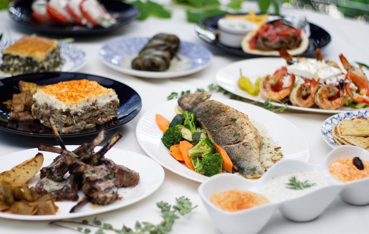 A spread of whole fish, lamb chops, moussaka, and more at Greek Isles Grill and Taverna. | Photo by Greek Isles Grill and Taverna