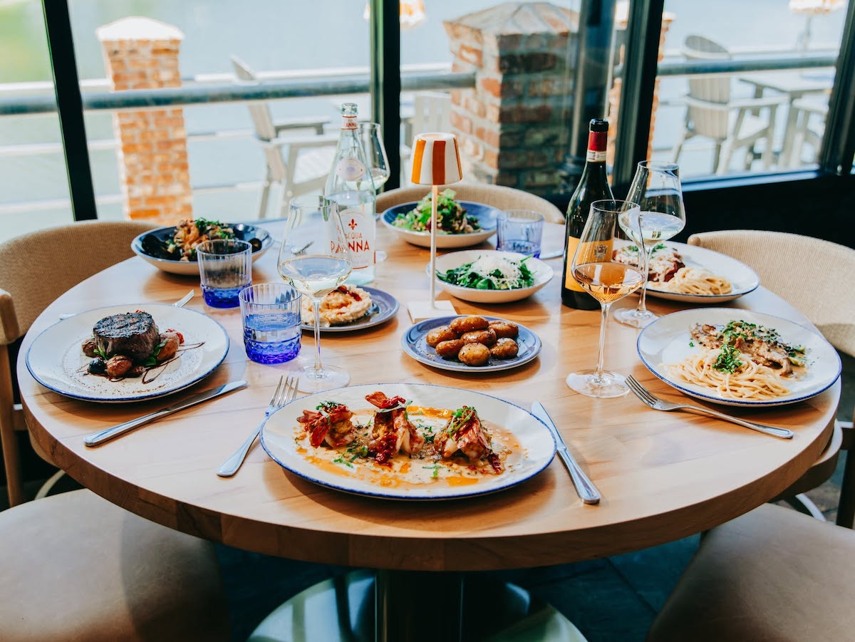 Lakeside views from inside the dining room at Palmetto Osteria. | Photo by Palmetto Osteria