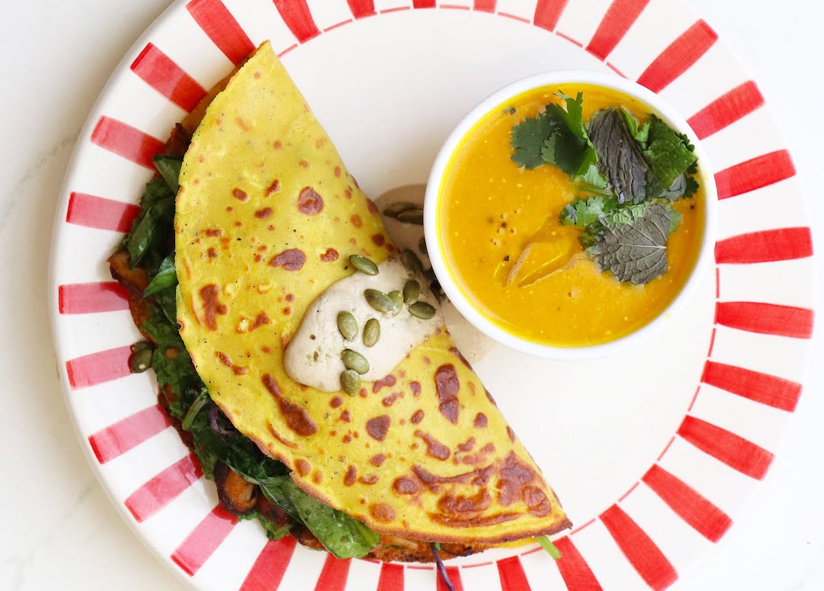 A vibrant plant-forward dosa at Pondicheri, where chef Anita Jaisinghani puts a modern spin on Indian dishes. | Photo by Pondicheri