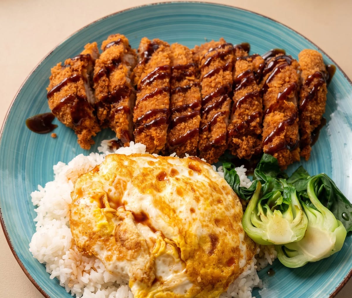 Rice to Meet You - DiningOut Thick-cut pork katsu with rice at Rice to Meet You. | Photo by Rice to Meet You