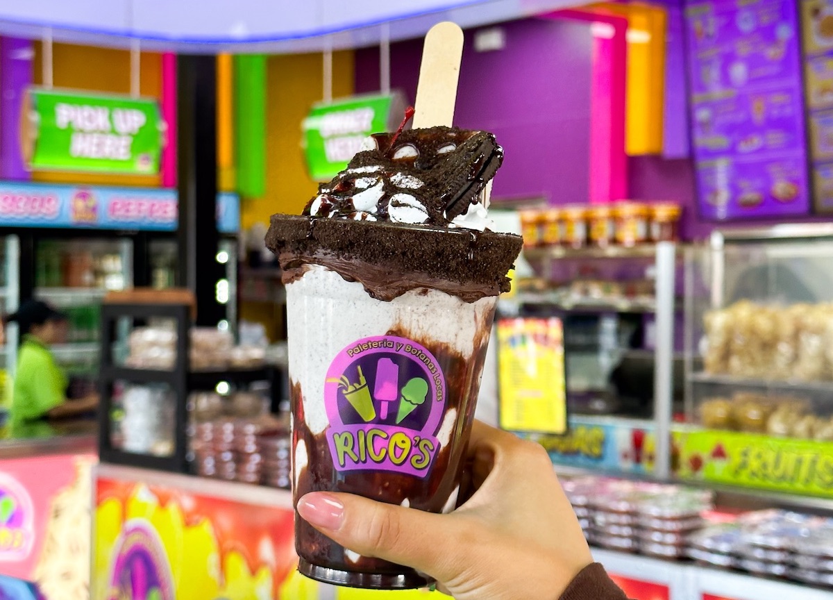 Rico’s Paleteria y Botanas Locas is known for over-the-top Mexican desserts piled high with ice cream, brownies, churros, and colorful toppings. | Photo by Rico’s Paleteria y Botanas Locas